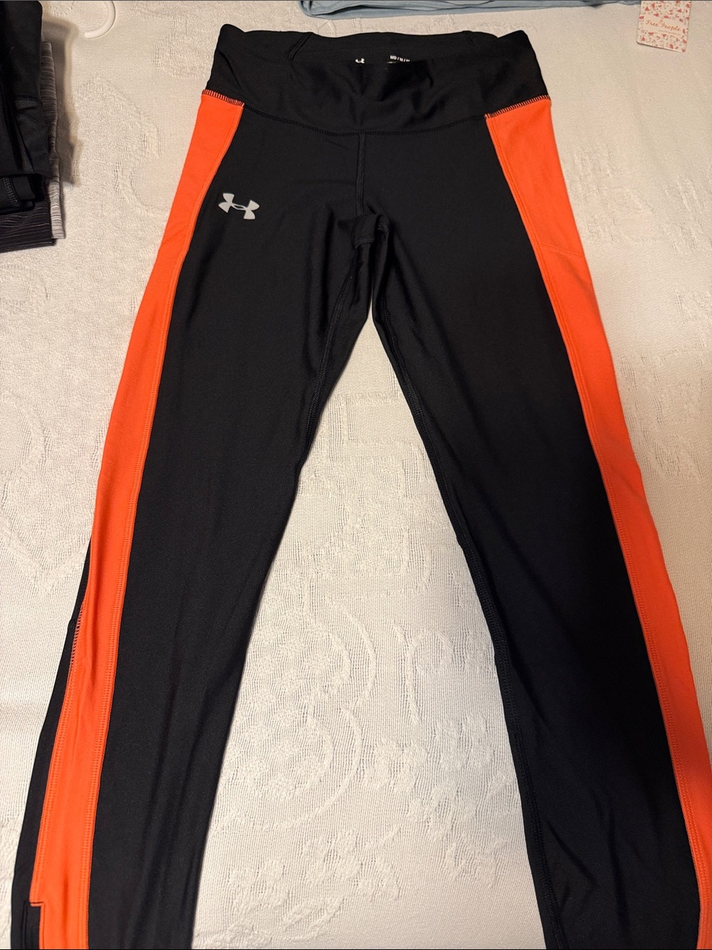 Under Armour Black Leggings with Bright Orange Side Stripes